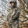 Angler wearing Prologic High Grade Realtree Thermo Fishing Suit with hood up