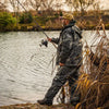 Angler wearing Prologic High Grade Realtree Thermo Fishing Suit by River